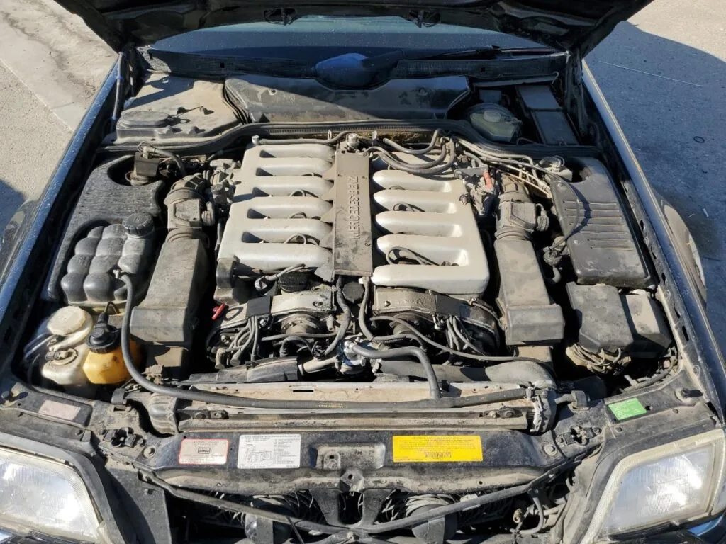 Mercedes-Benz SL 600 R129 1993 — Preto/Preto (Hard top + bancos traseiros, DEALER ONLY)