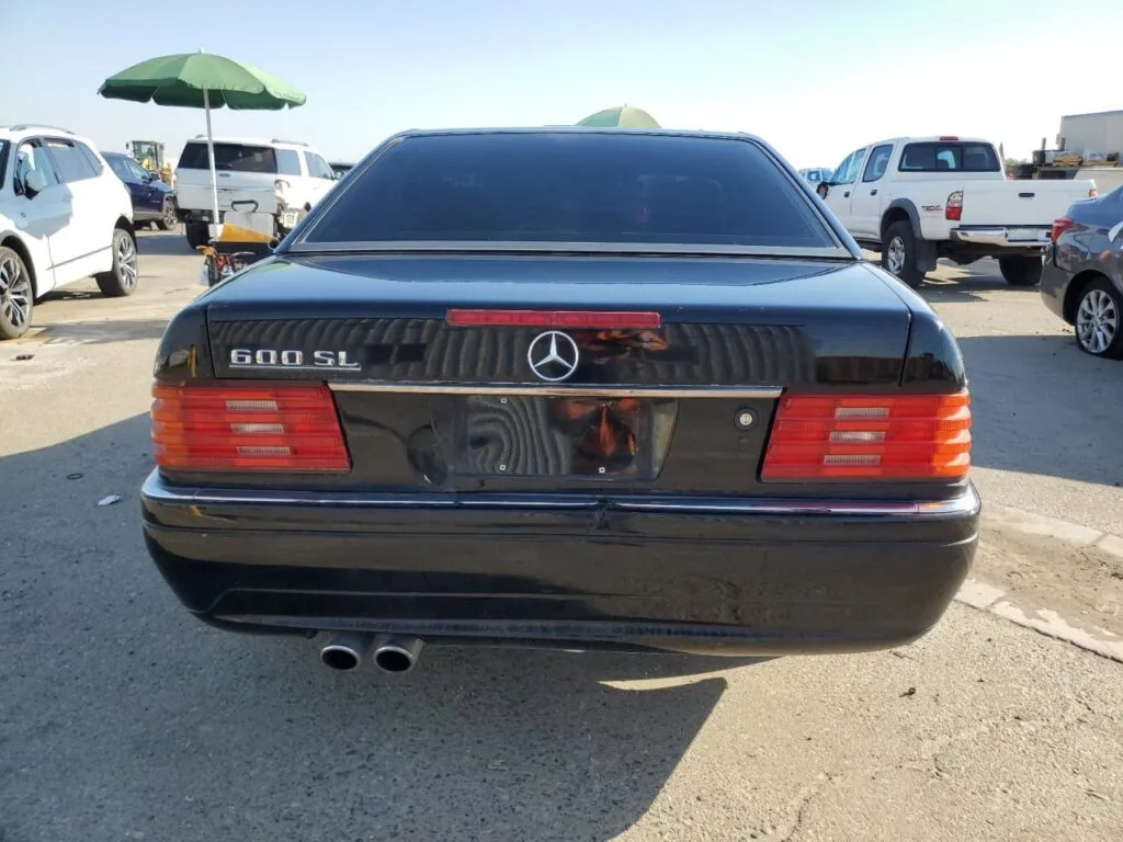 Mercedes-Benz SL 600 R129 1993 — Preto/Preto (Hard top + bancos traseiros, DEALER ONLY)